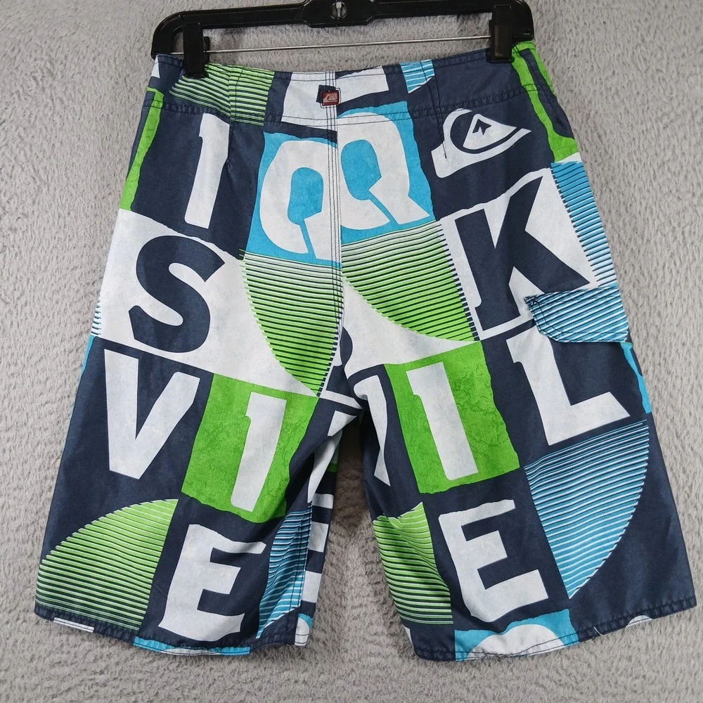 Quiksilver Board Shorts All Over Logo Spellout Swim Trunks Size 28 Blue Lime EUC